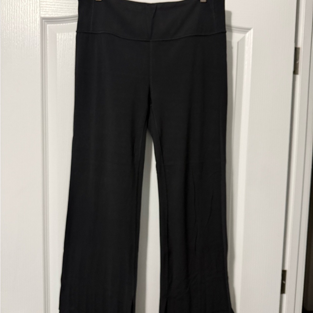 Athleta Black Wide-Leg Pants. Split seam on bottom of pants. XL.